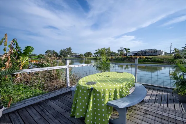 a view of a chairs on the roof deck