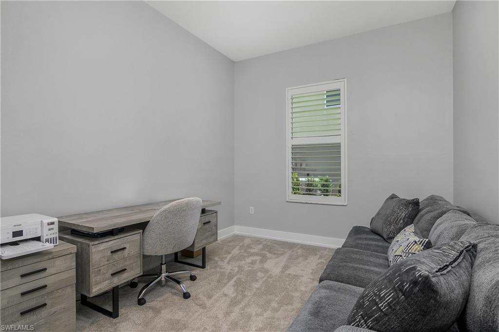 24361 Copperleaf Boulevard Estero, FL 34135 - Photo 15 of 49 a bedroom with a bed and a window