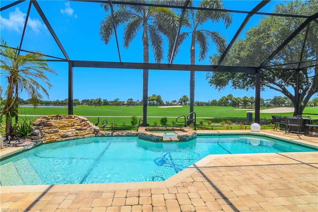 24361 Copperleaf Boulevard Estero, FL 34135 - Photo 24 of 49 a view of a backyard with a garden and plants