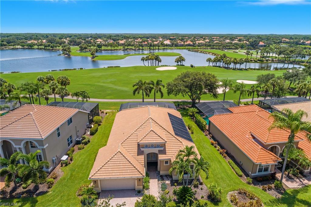 24361 Copperleaf Boulevard Estero, FL 34135 - Photo 3 of 49 an aerial view of residential houses with outdoor space and river
