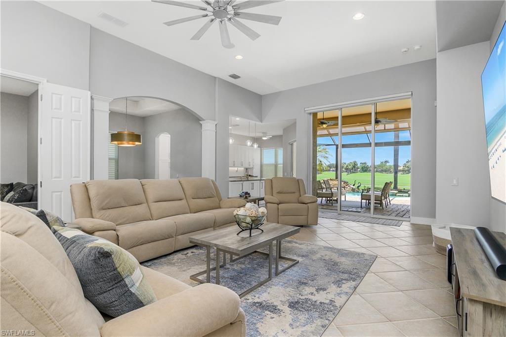 24361 Copperleaf Boulevard Estero, FL 34135 - Photo 7 of 49 a living room with furniture and a large window