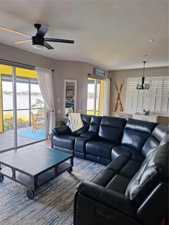 a room with furniture and a flat screen tv