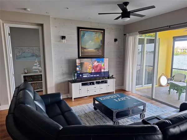 a living room with furniture and a window