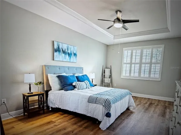 a bathroom with a double vanity sink mirror double and shower