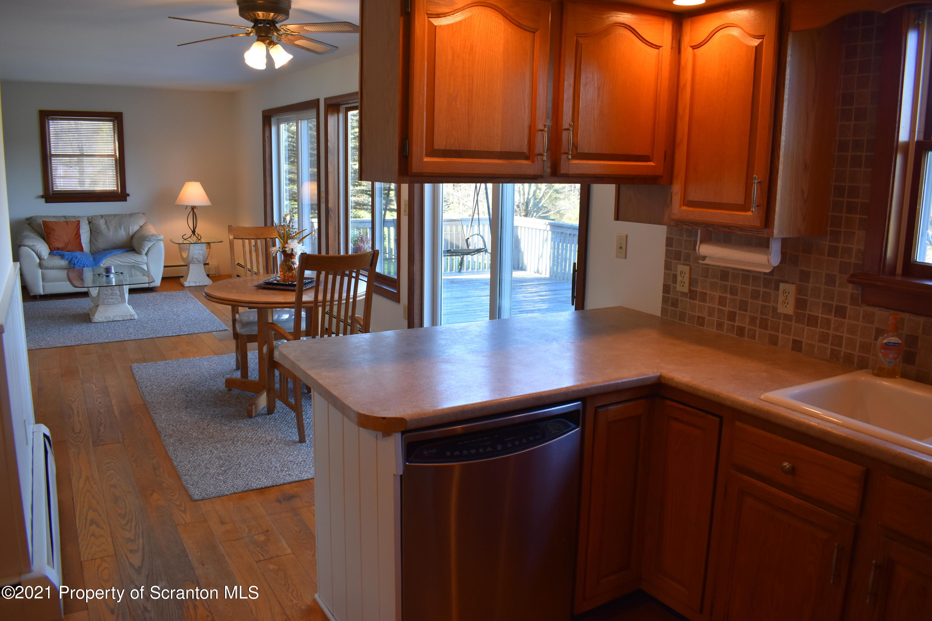 15375 State Rte 3001 Montrose, PA 18801 - Photo 11 of 82 a kitchen with stainless steel appliances granite countertop a sink a table and chairs