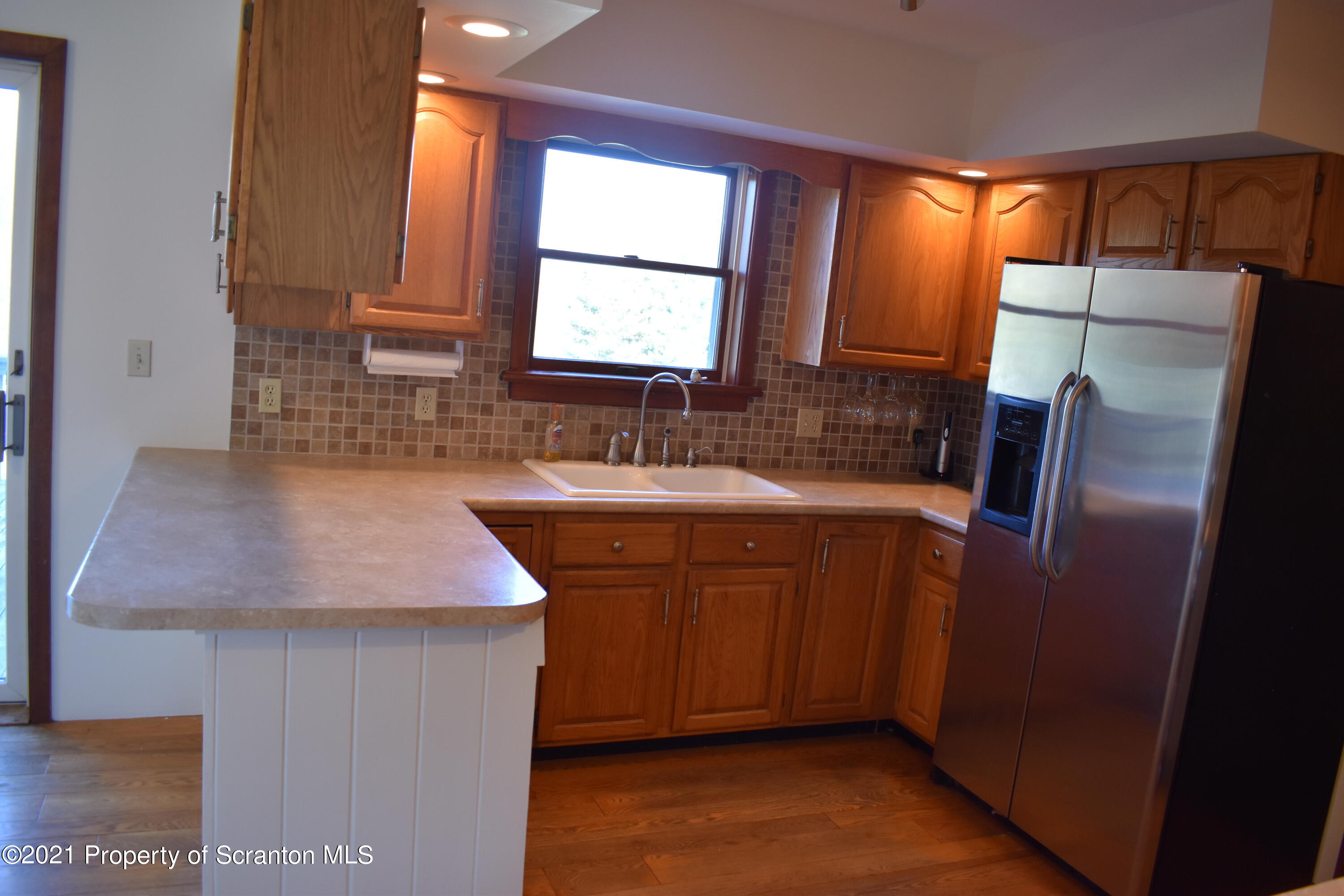 15375 State Rte 3001 Montrose, PA 18801 - Photo 12 of 82 a kitchen with stainless steel appliances a sink stove and a refrigerator