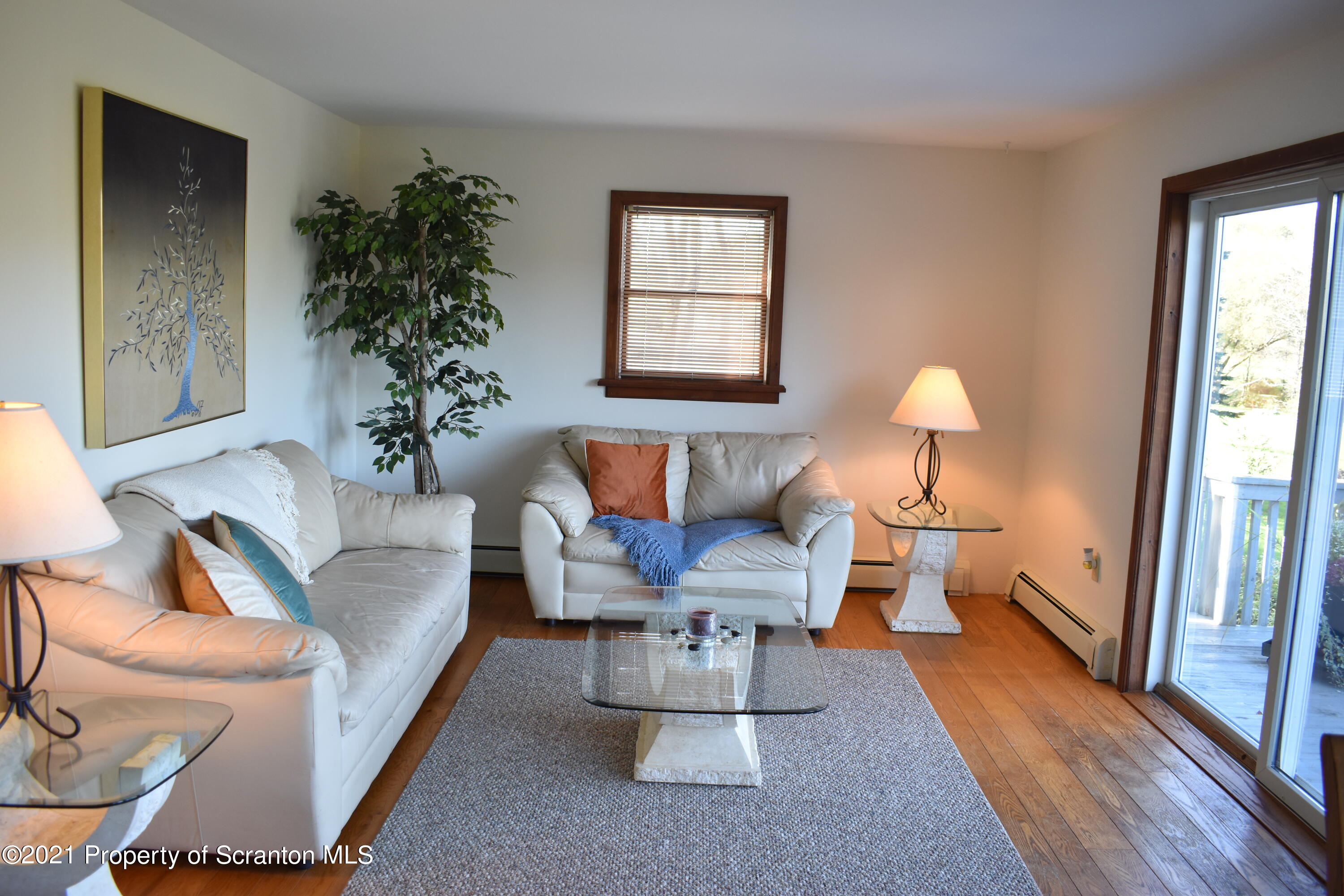 15375 State Rte 3001 Montrose, PA 18801 - Photo 19 of 82 a living room with furniture and a large window