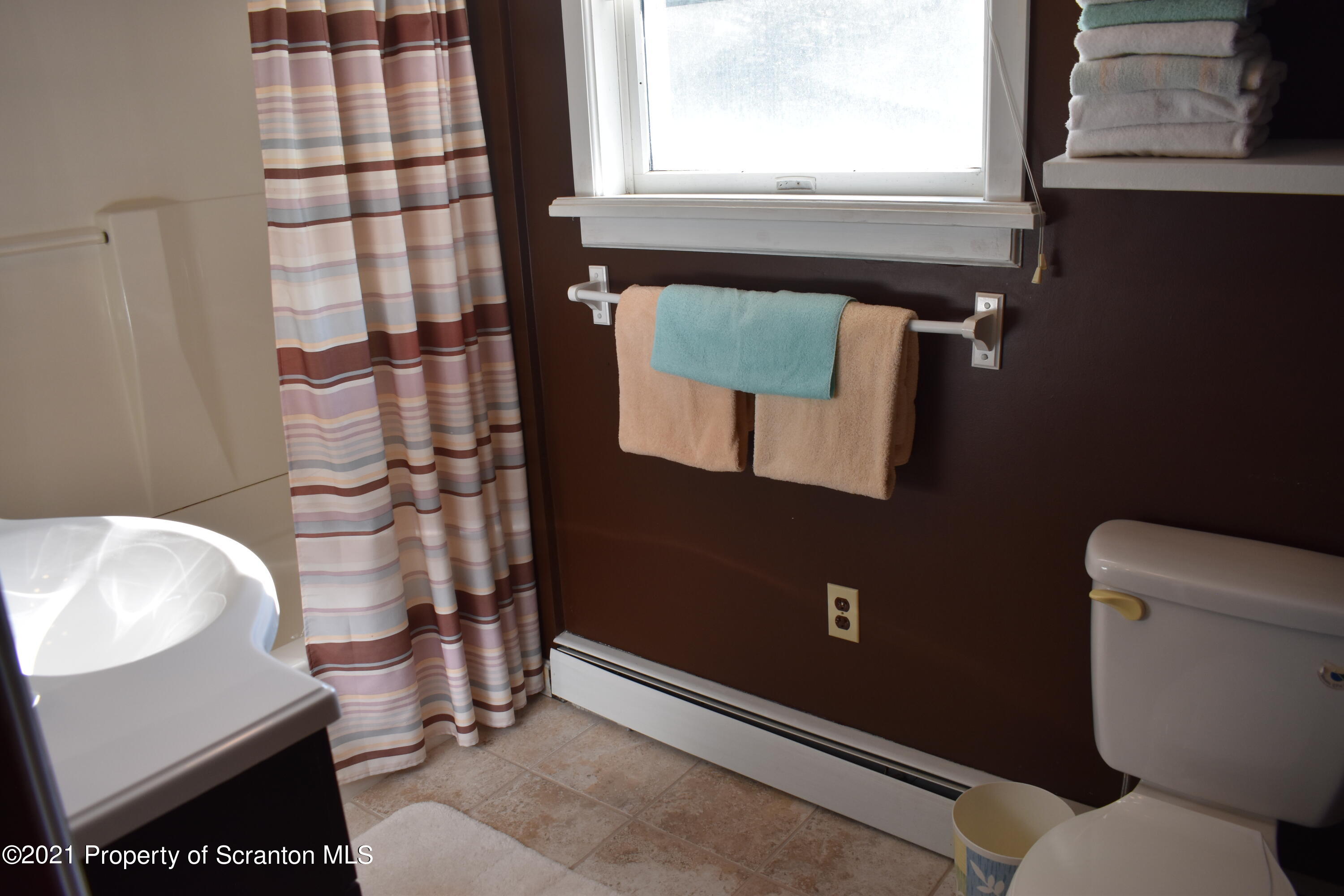 15375 State Rte 3001 Montrose, PA 18801 - Photo 35 of 82 a bathroom with a sink toilet and shower
