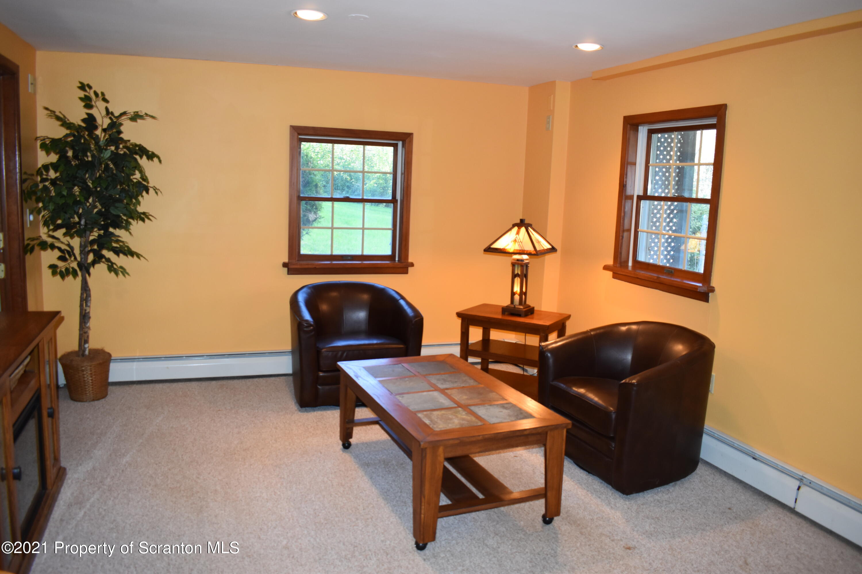15375 State Rte 3001 Montrose, PA 18801 - Photo 44 of 82 a living room with furniture and a potted plant
