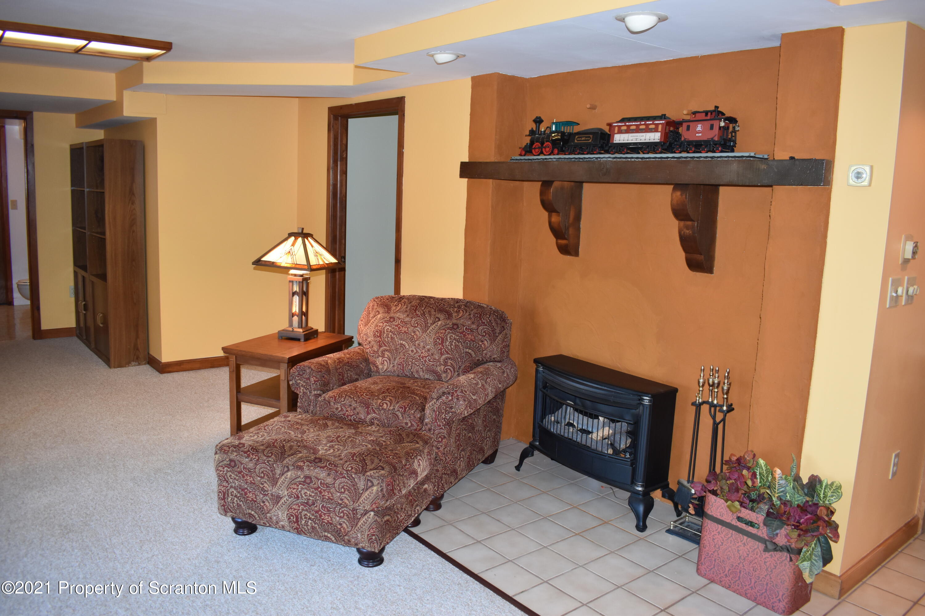 15375 State Rte 3001 Montrose, PA 18801 - Photo 47 of 82 a living room with furniture and a dresser