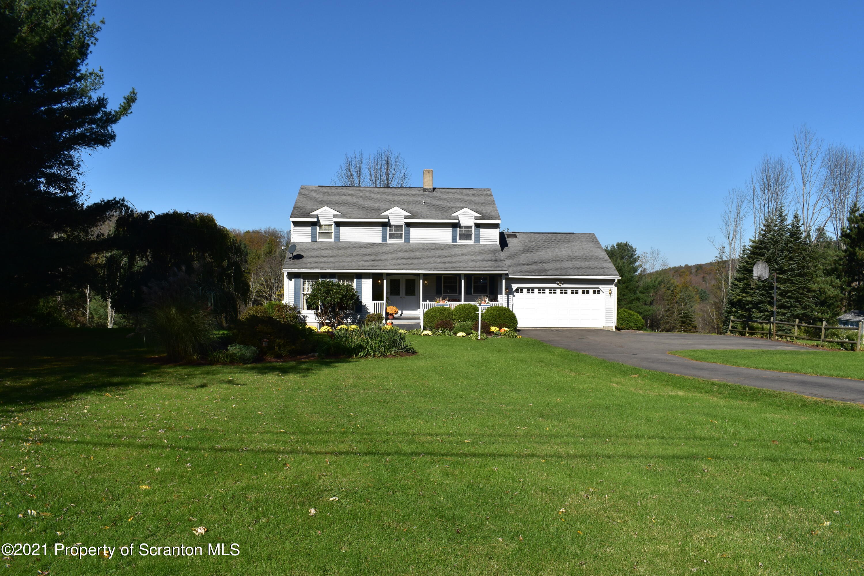 15375 State Rte 3001 Montrose, PA 18801 - Photo 79 of 82 a front view of a house with a garden