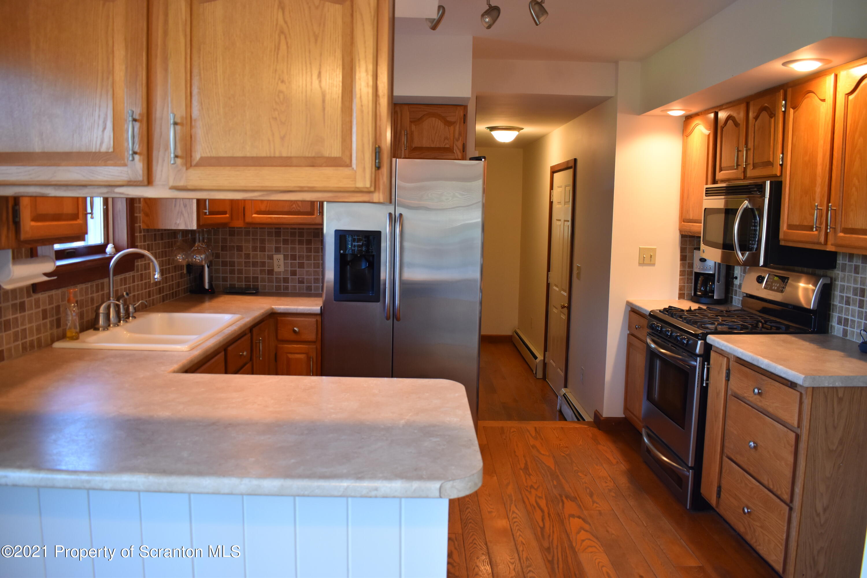 15375 State Rte 3001 Montrose, PA 18801 - Photo 8 of 82 a kitchen with stainless steel appliances granite countertop a sink a stove and a refrigerator