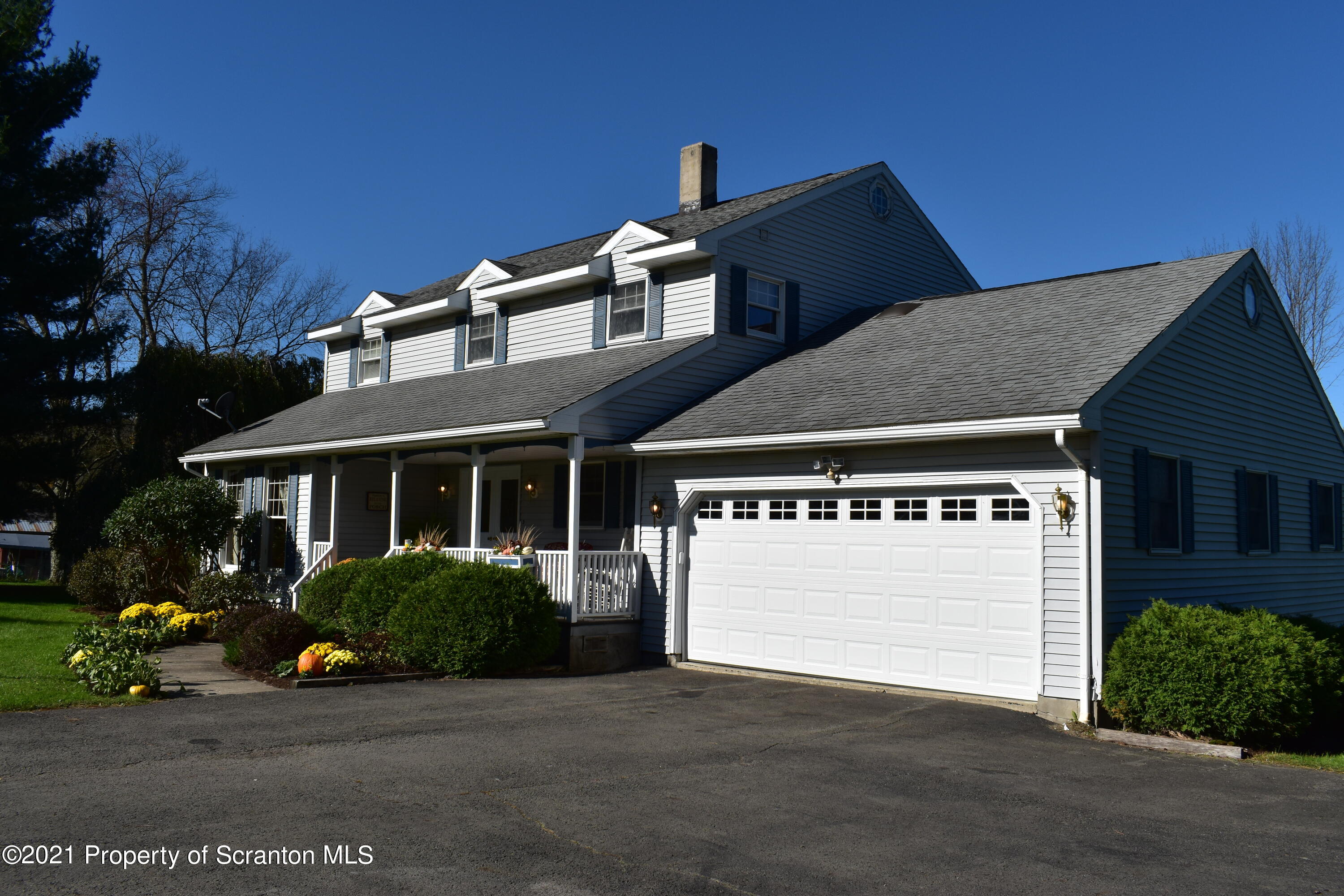 15375 State Rte 3001 Montrose, PA 18801 - Photo 81 of 82 a front view of a house with a garage