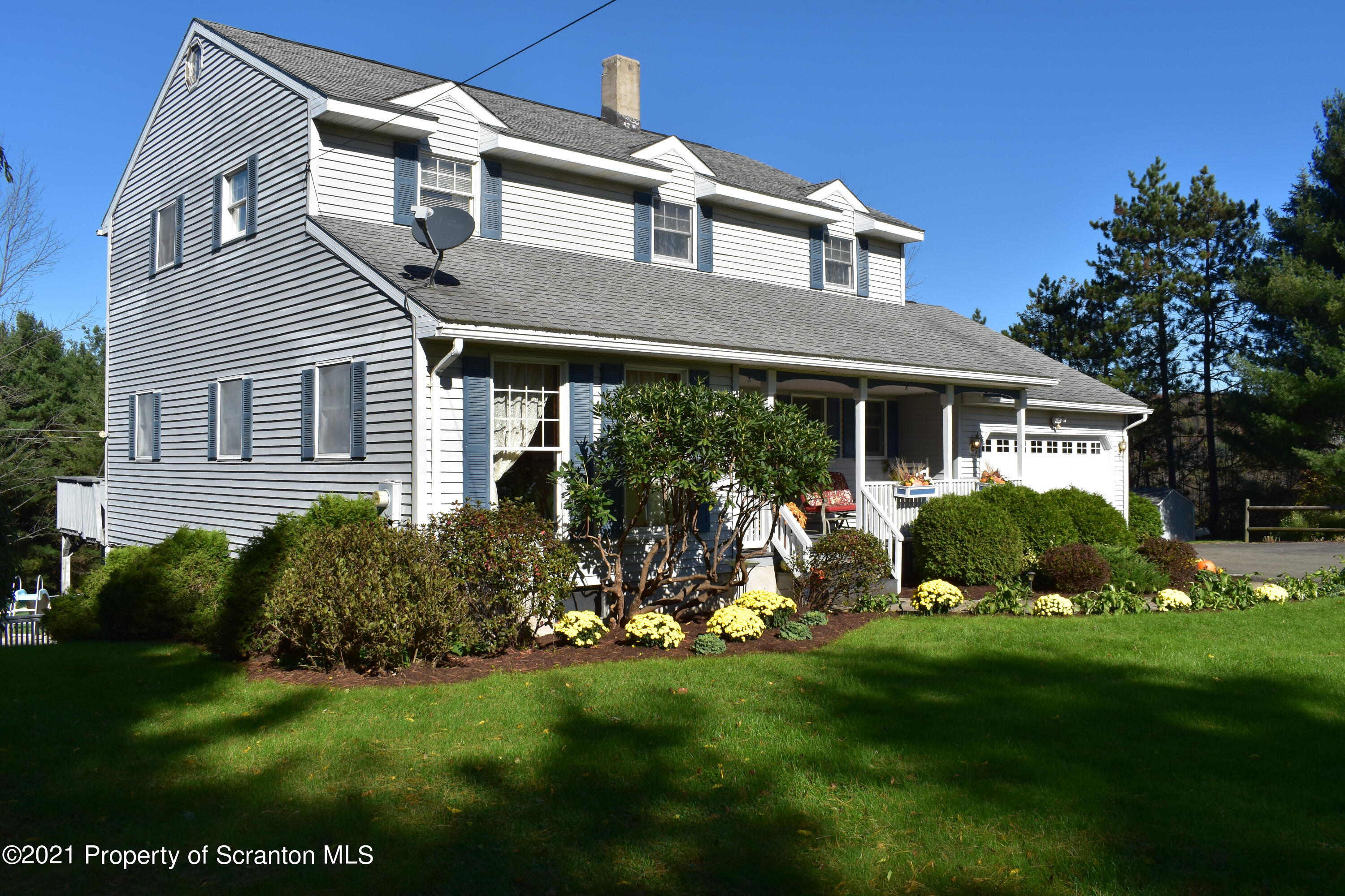 15375 State Rte 3001 Montrose, PA 18801 - Photo 82 of 82 a front view of a house with a yard and green space