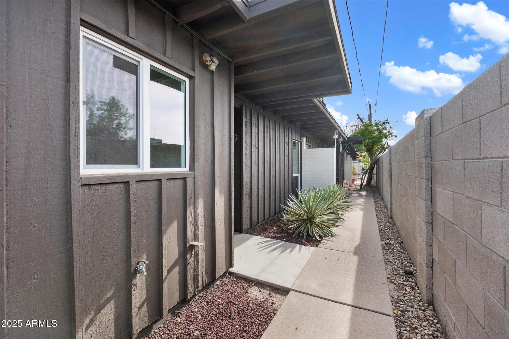 1450 East Bethany Home Road, Unit 8 Phoenix, AZ 85014 - Photo 21 of 30 a view of a house with a potted plant
