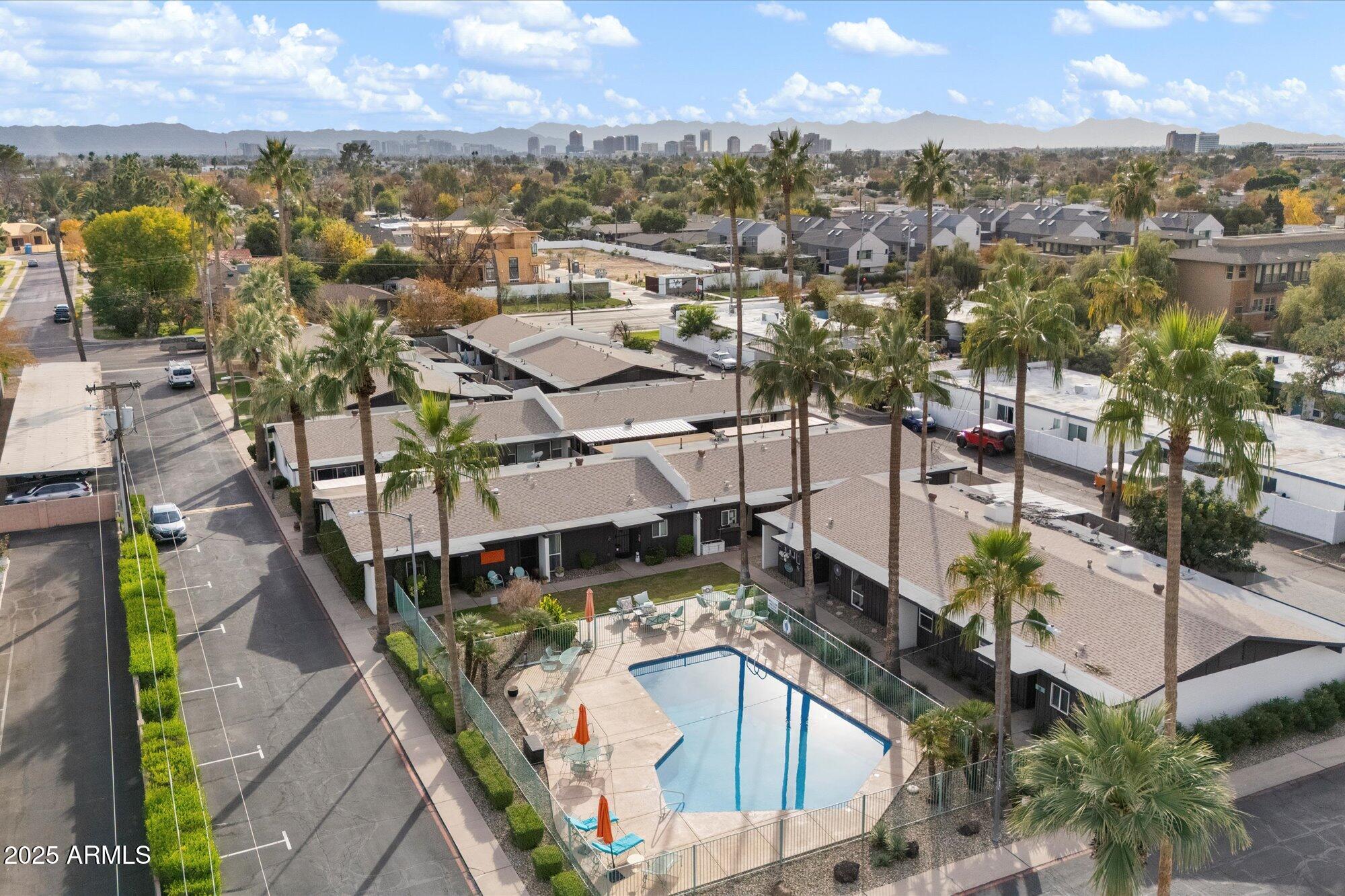 1450 East Bethany Home Road, Unit 8 Phoenix, AZ 85014 - Photo 25 of 29 a view of a house with a ocean view