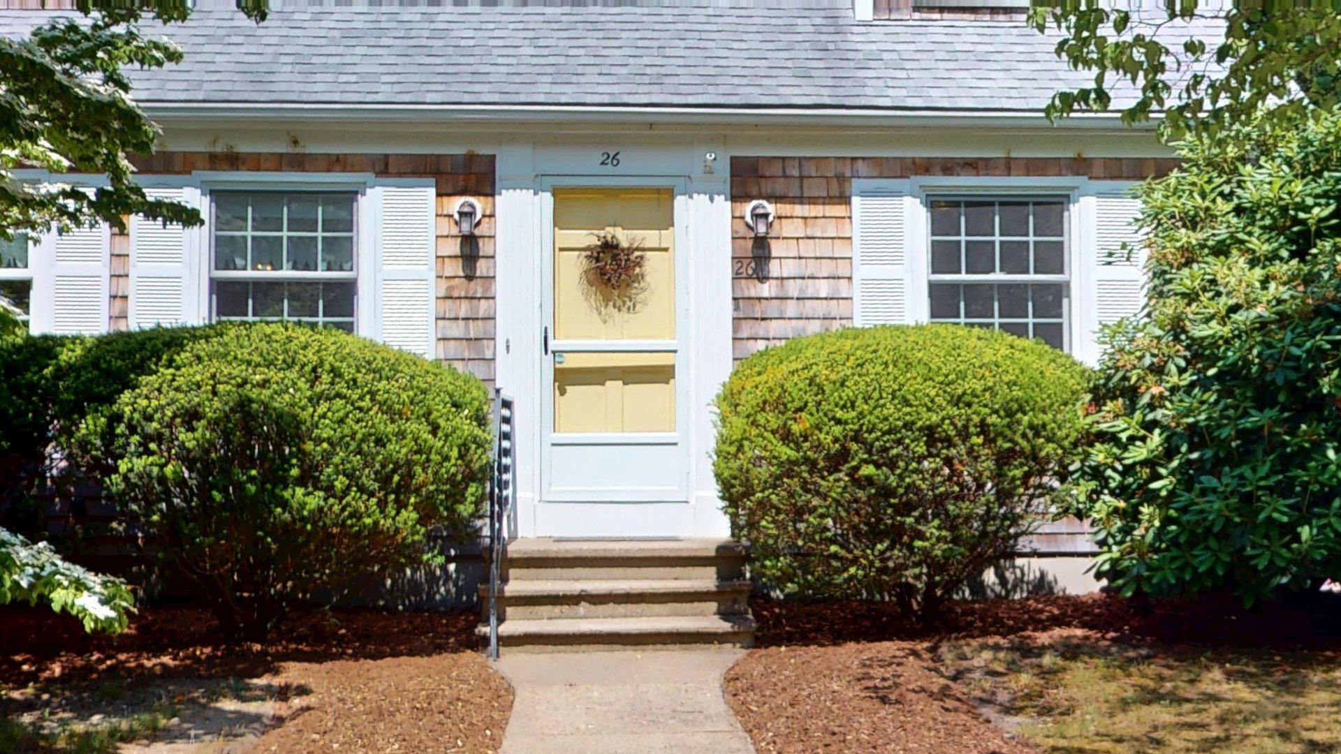26 Newport Road Brewster, MA 02631 - Photo 2 of 61 a view of a house with potted plants