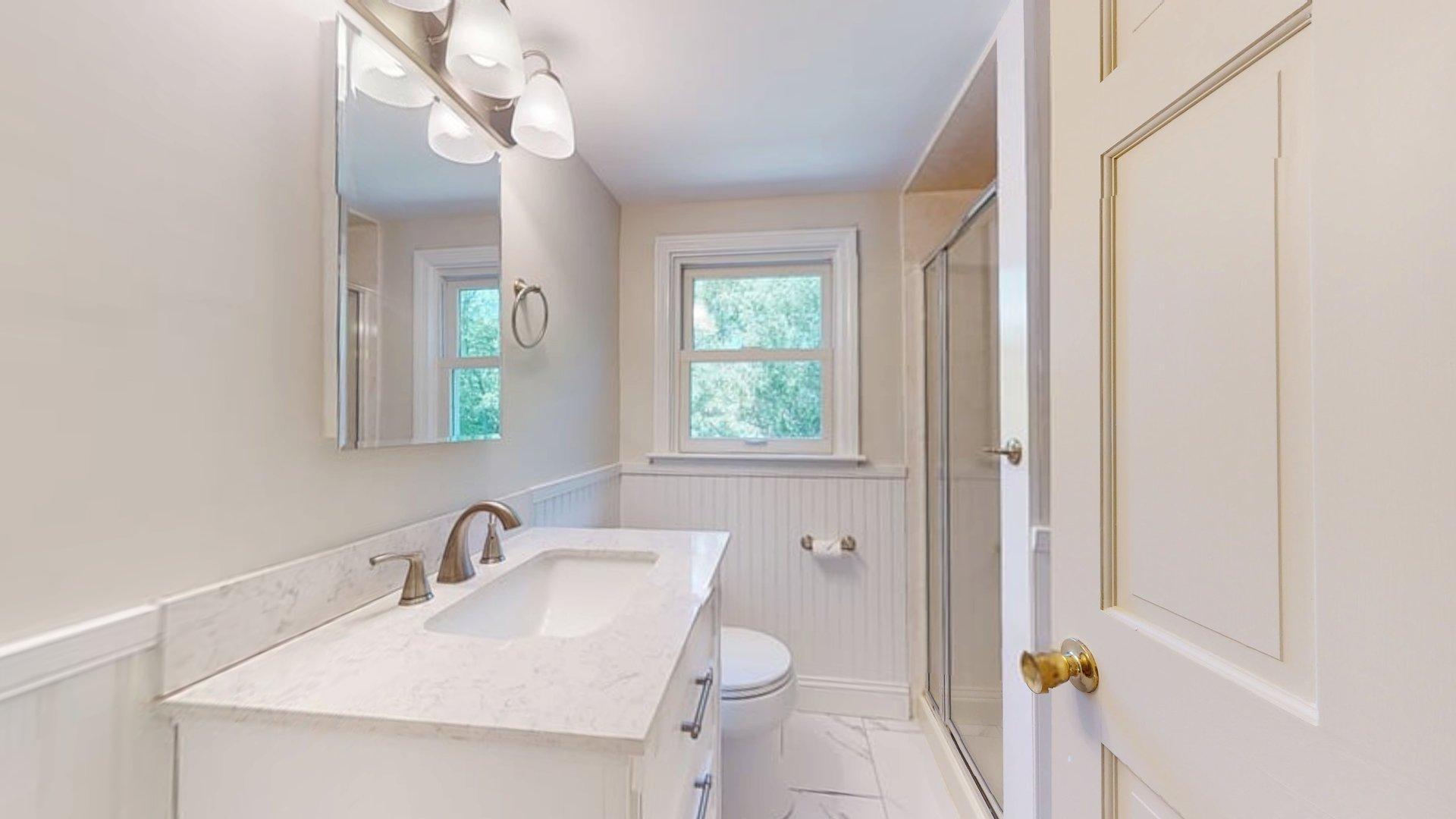 26 Newport Road Brewster, MA 02631 - Photo 22 of 61 a bathroom with a sink and a mirror