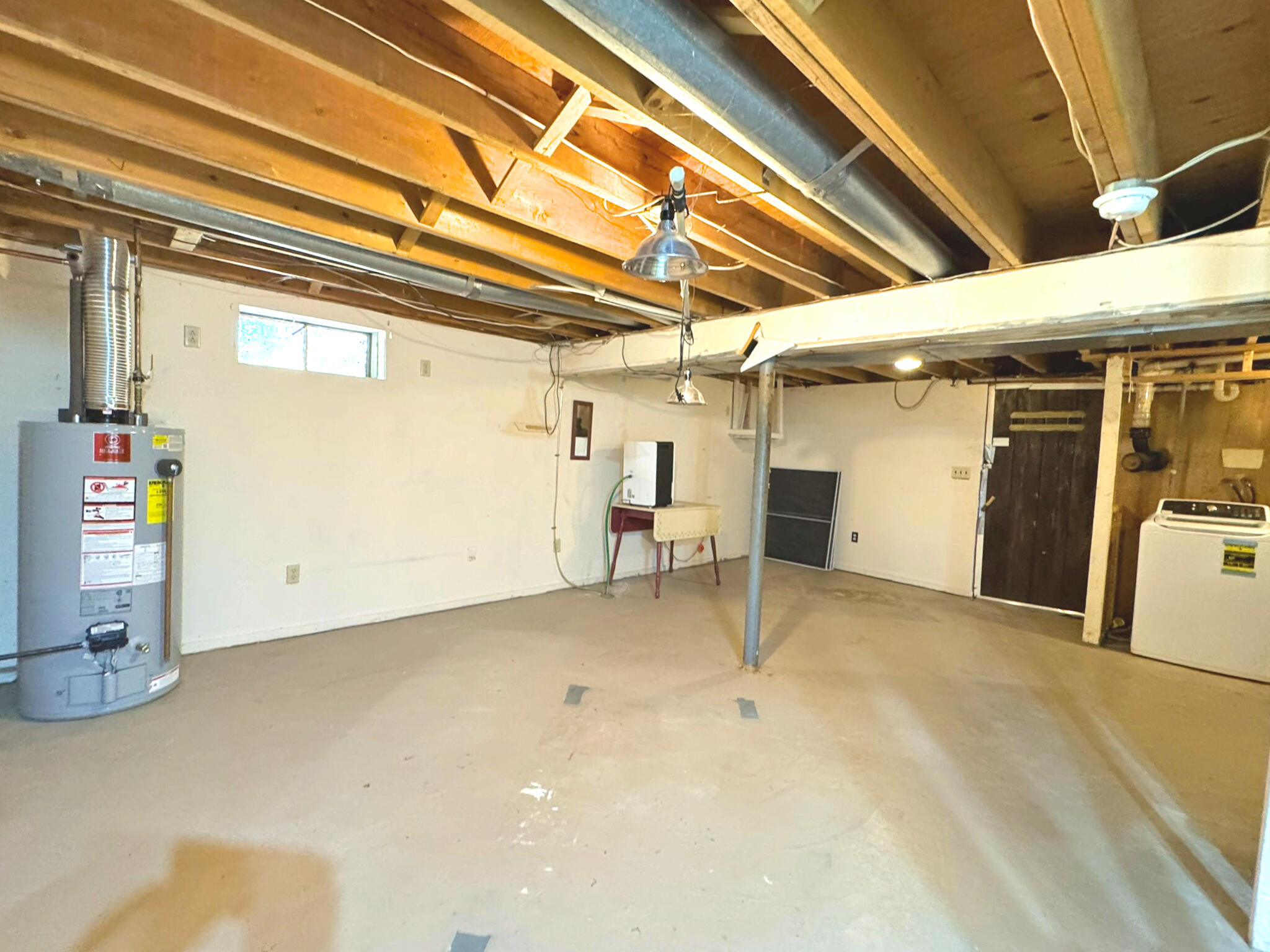 26 Newport Road Brewster, MA 02631 - Photo 27 of 61 a view of a garage with furniture