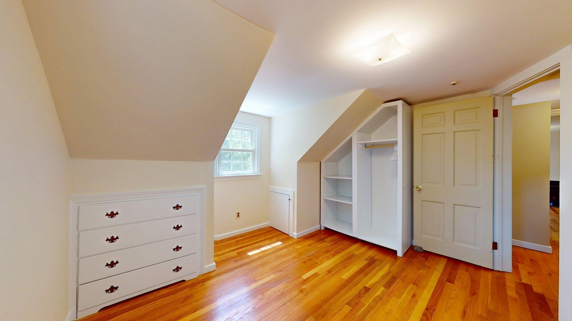 26 Newport Road Brewster, MA 02631 - Photo 45 of 61 wooden floor in an empty room with a window