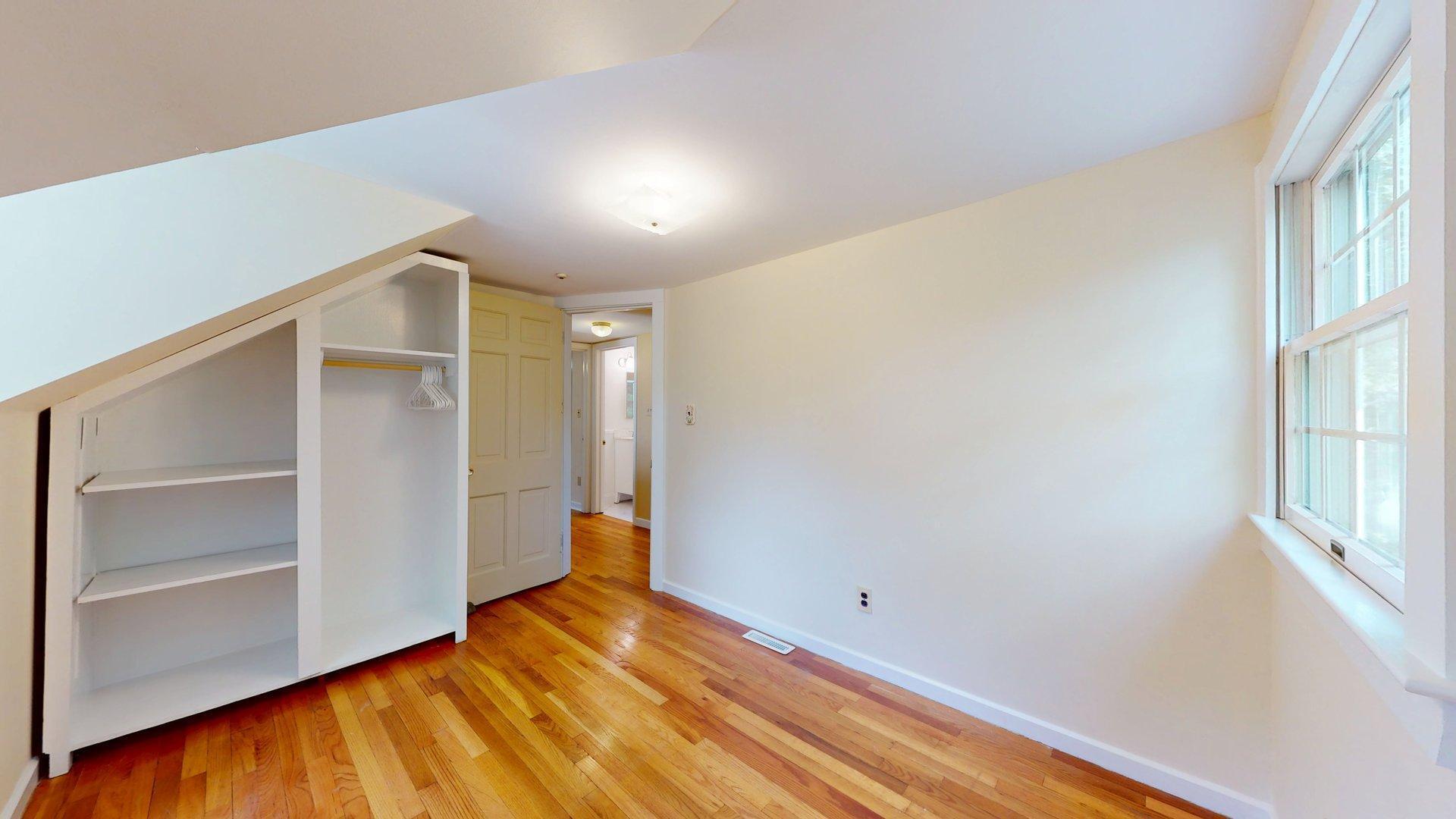 26 Newport Road Brewster, MA 02631 - Photo 52 of 61 a view of empty room with wooden floor and fan