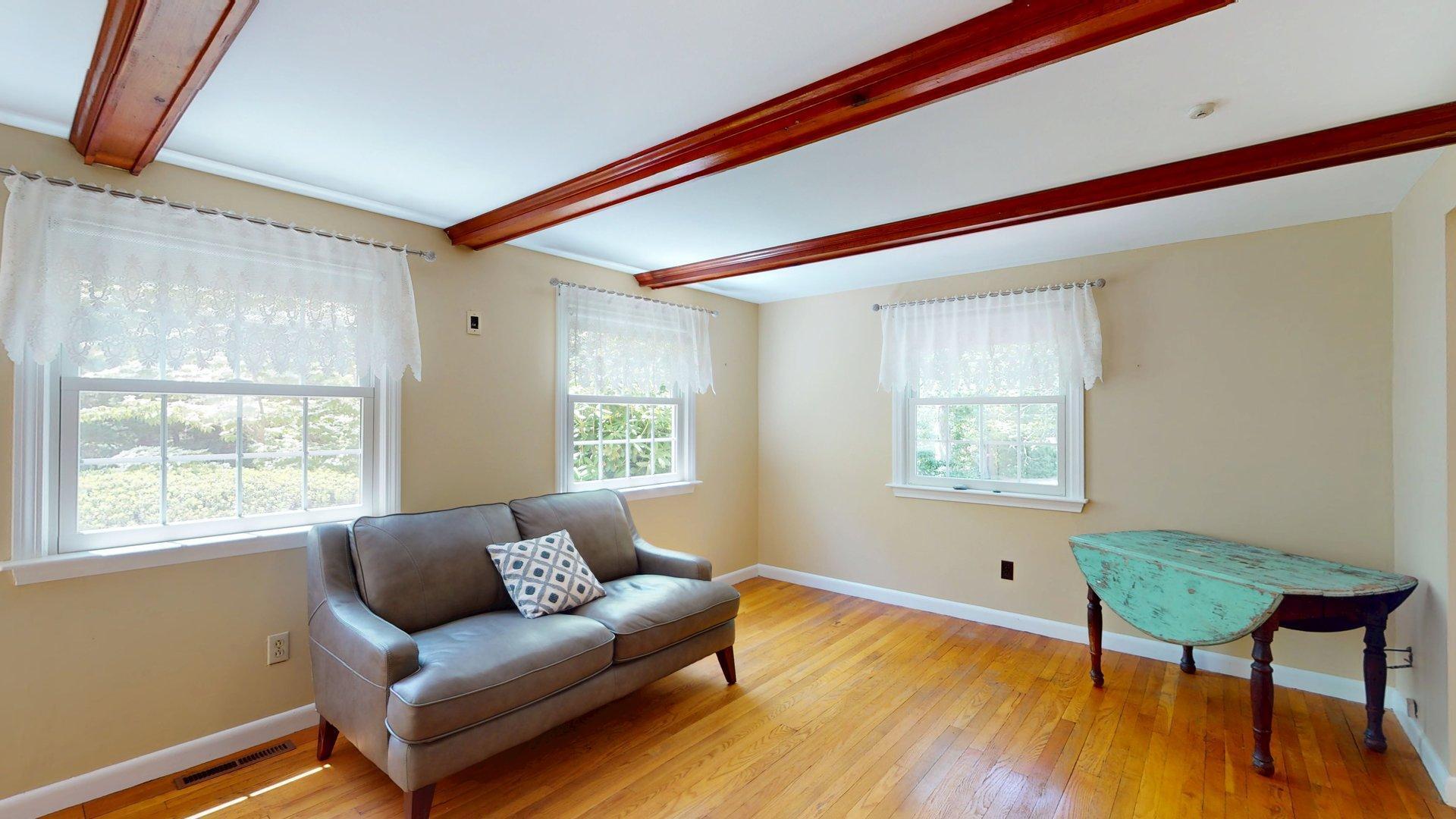 26 Newport Road Brewster, MA 02631 - Photo 7 of 61 a living room with furniture and a window