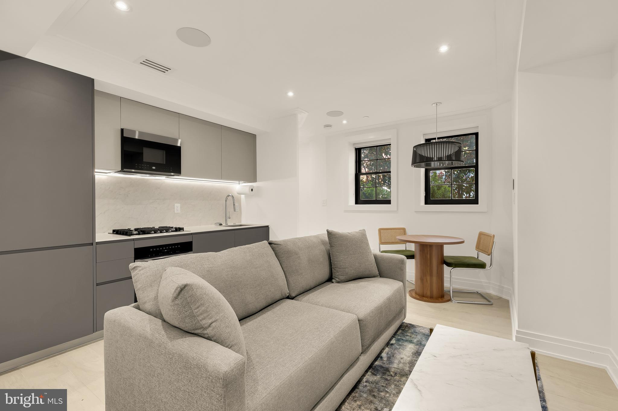 a living room with furniture and a couch