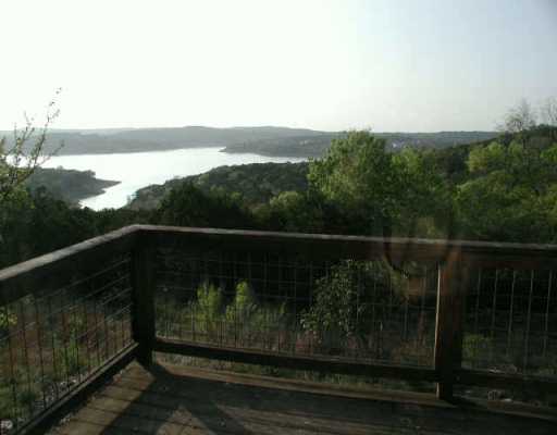 404 Summit Ridge Drive North Point Venture, TX 78645 - Photo 1 of 1 a view of a balcony with lake view