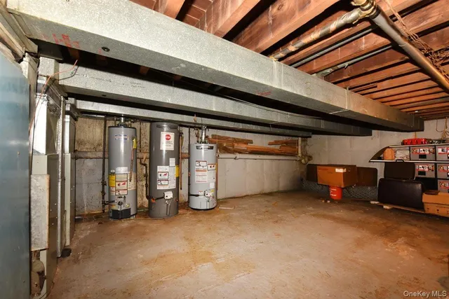 a view of a room with wooden shelves