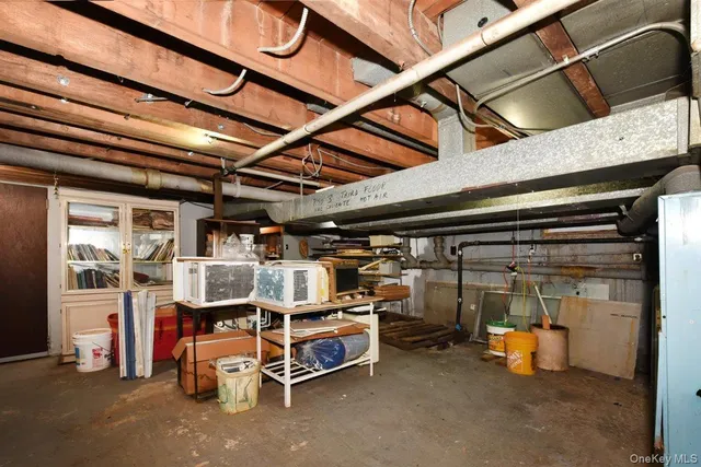 a car parked in front of a brick building