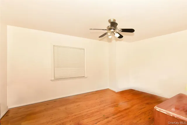 a view of a big room with wooden floor
