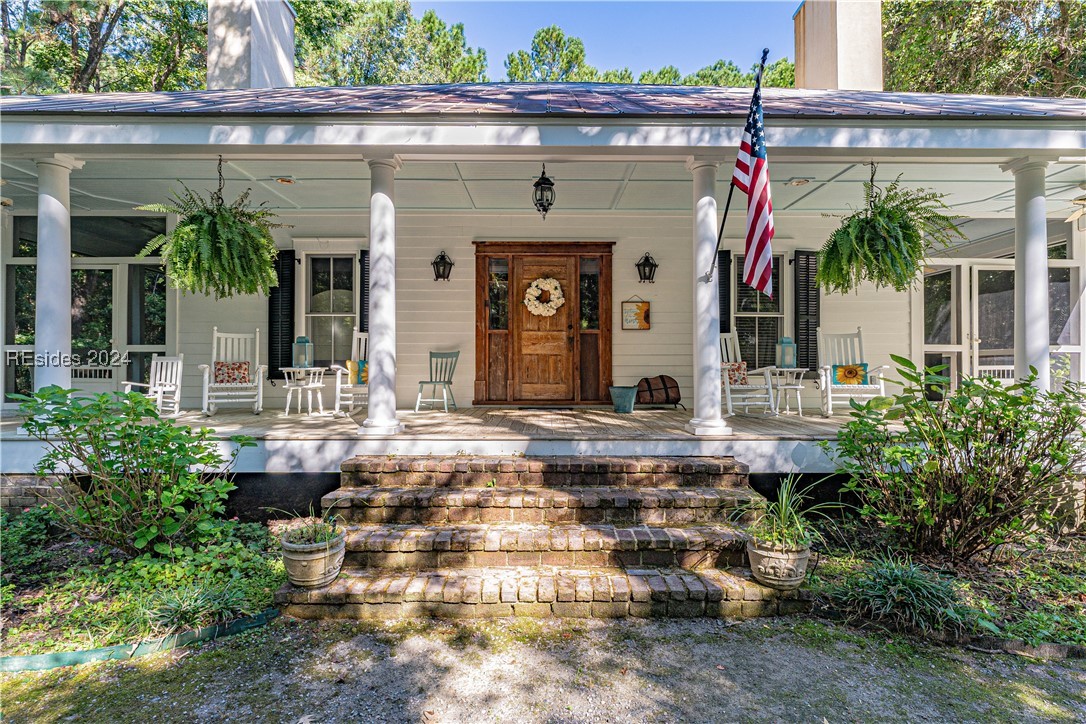 92 Dean Hall Road Seabrook, SC 29940 - Photo 22 of 99 Caretaker's cottage at Dean Hall's arrival point and entrance