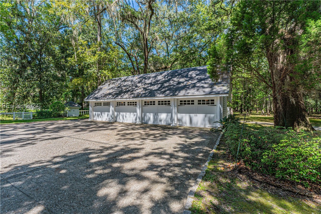 92 Dean Hall Road Seabrook, SC 29940 - Photo 26 of 99 Primary residence four bay, large garage