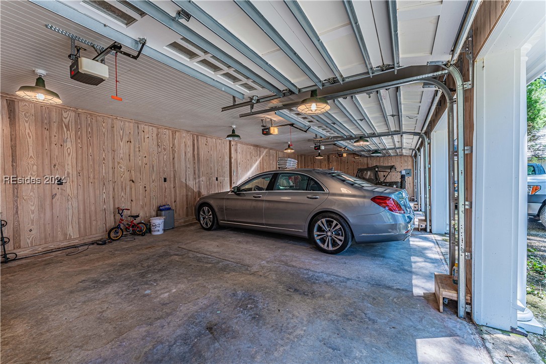 92 Dean Hall Road Seabrook, SC 29940 - Photo 27 of 99 Finished / paneled garage