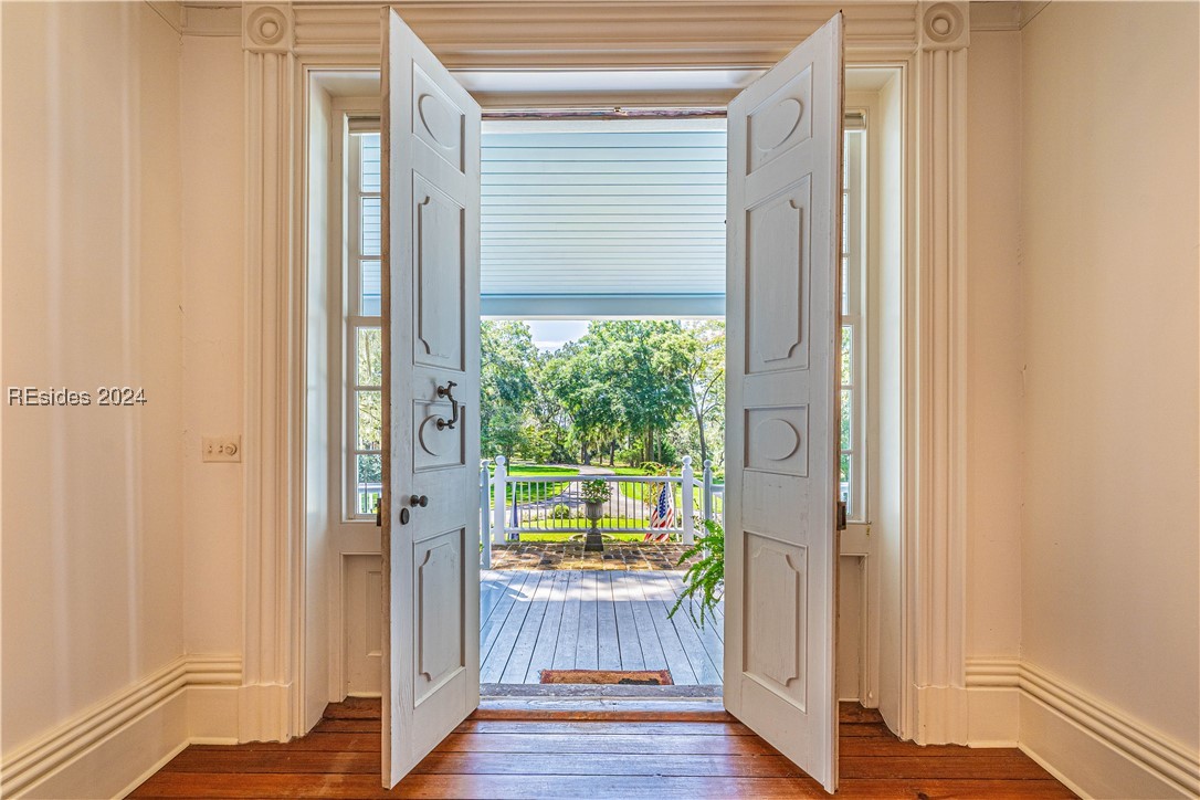 92 Dean Hall Road Seabrook, SC 29940 - Photo 40 of 99 Inside perspective of primary residence's South entrance