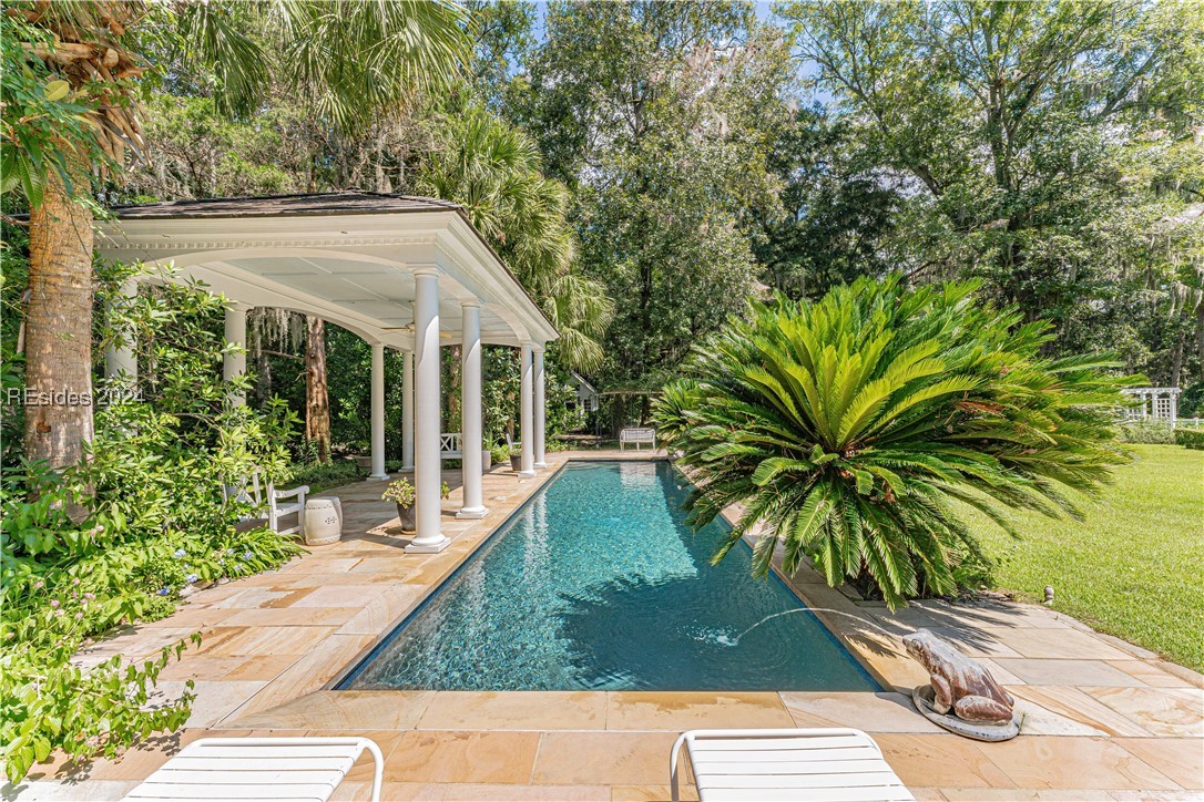 92 Dean Hall Road Seabrook, SC 29940 - Photo 51 of 99 Pool and elegant surrounds at the anchor location of North lawn adjacent the primary residence