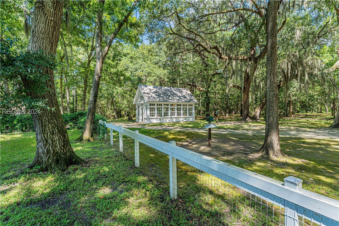 92 Dean Hall Road Seabrook, SC 29940 - Photo 71 of 99 North lawn / grounds perspective