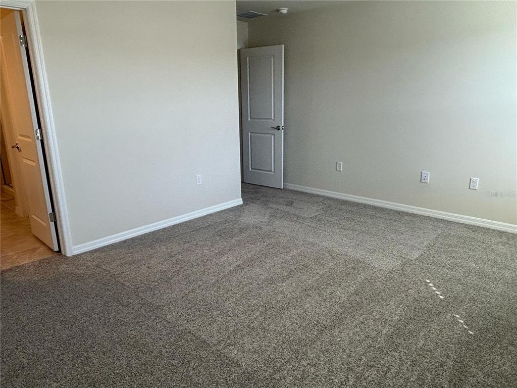 16274 Bright Leaf Road Winter Garden, FL 34787 - Photo 16 of 38 a view of an empty room