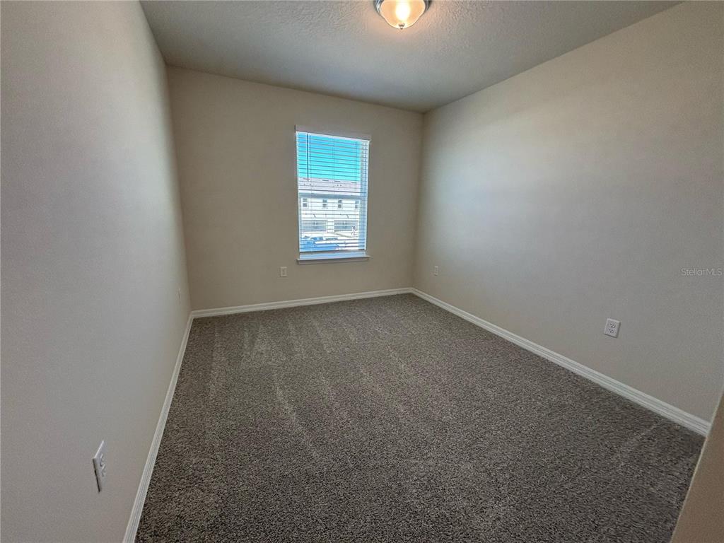 16274 Bright Leaf Road Winter Garden, FL 34787 - Photo 26 of 38 an empty room with a window