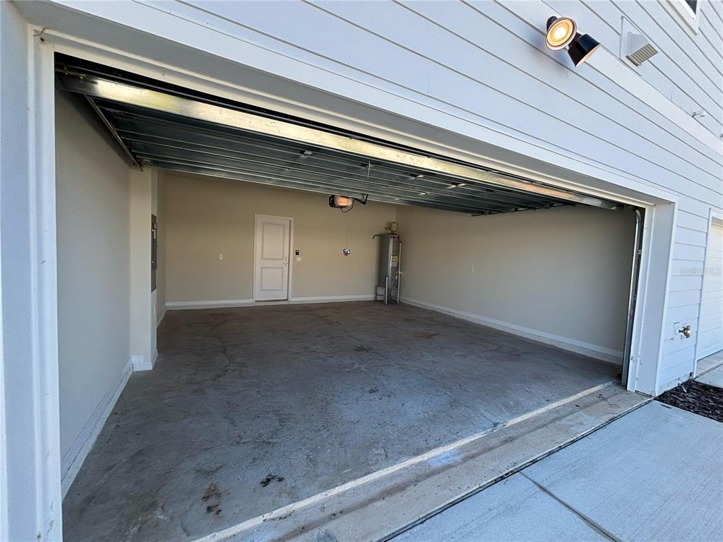 16274 Bright Leaf Road Winter Garden, FL 34787 - Photo 36 of 38 a view of a garage