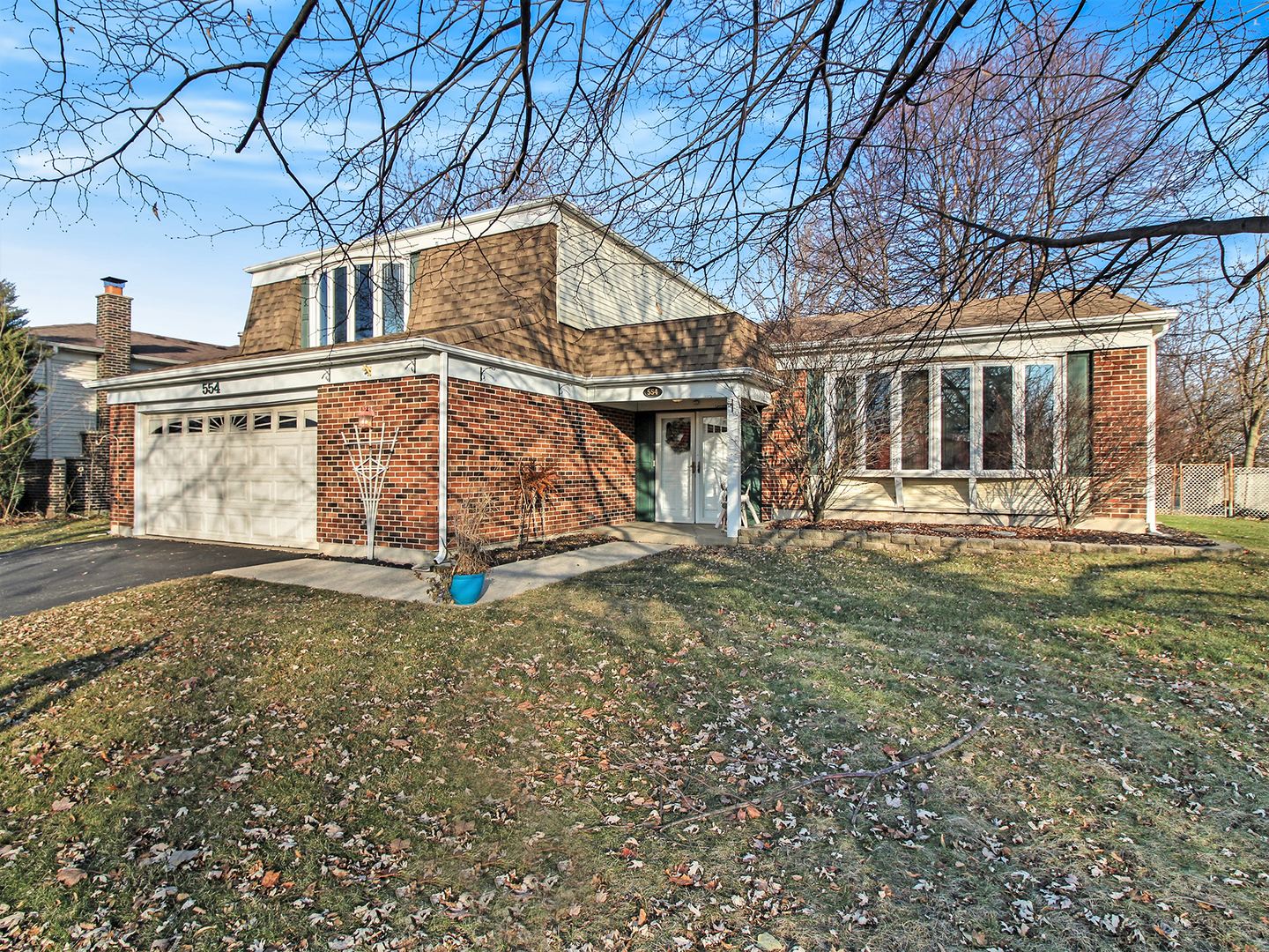 554 Rockhurst Road Bolingbrook, IL 60440 - Photo 1 of 29 front view of a house with a yard
