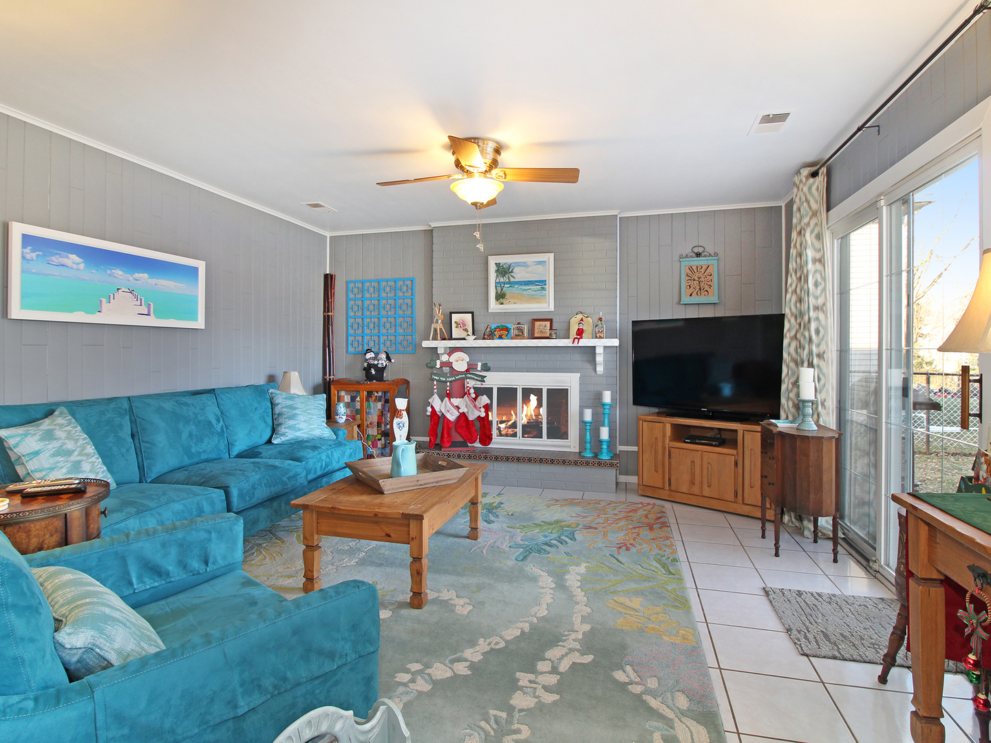 554 Rockhurst Road Bolingbrook, IL 60440 - Photo 11 of 29 a living room with furniture and a flat screen tv