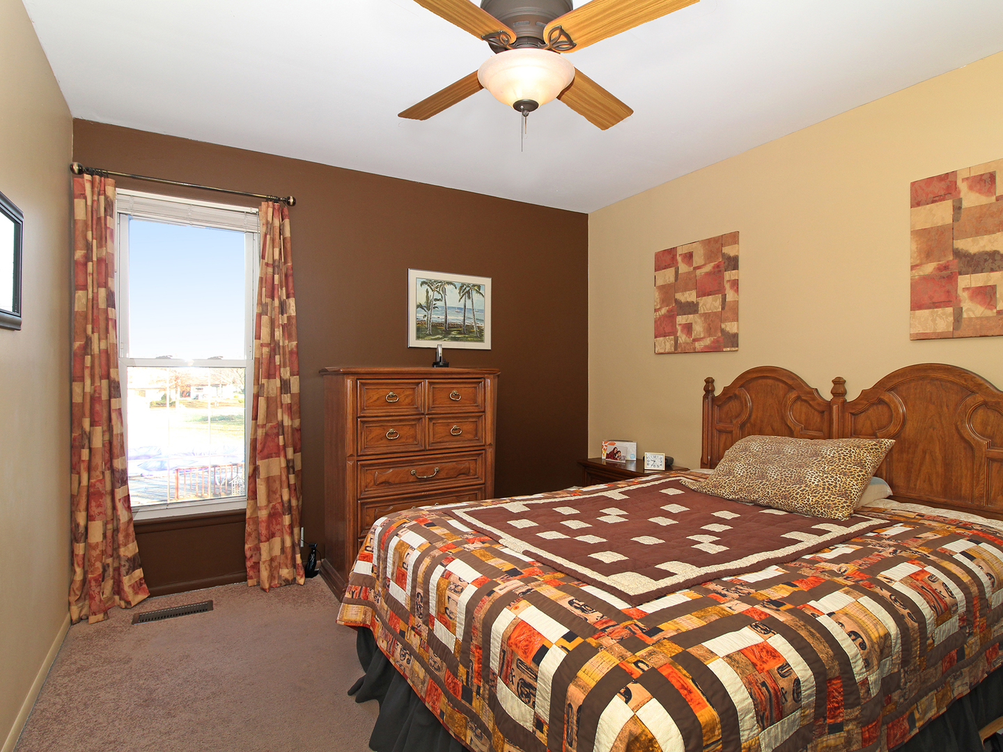554 Rockhurst Road Bolingbrook, IL 60440 - Photo 20 of 29 a bedroom with a bed and a chandelier