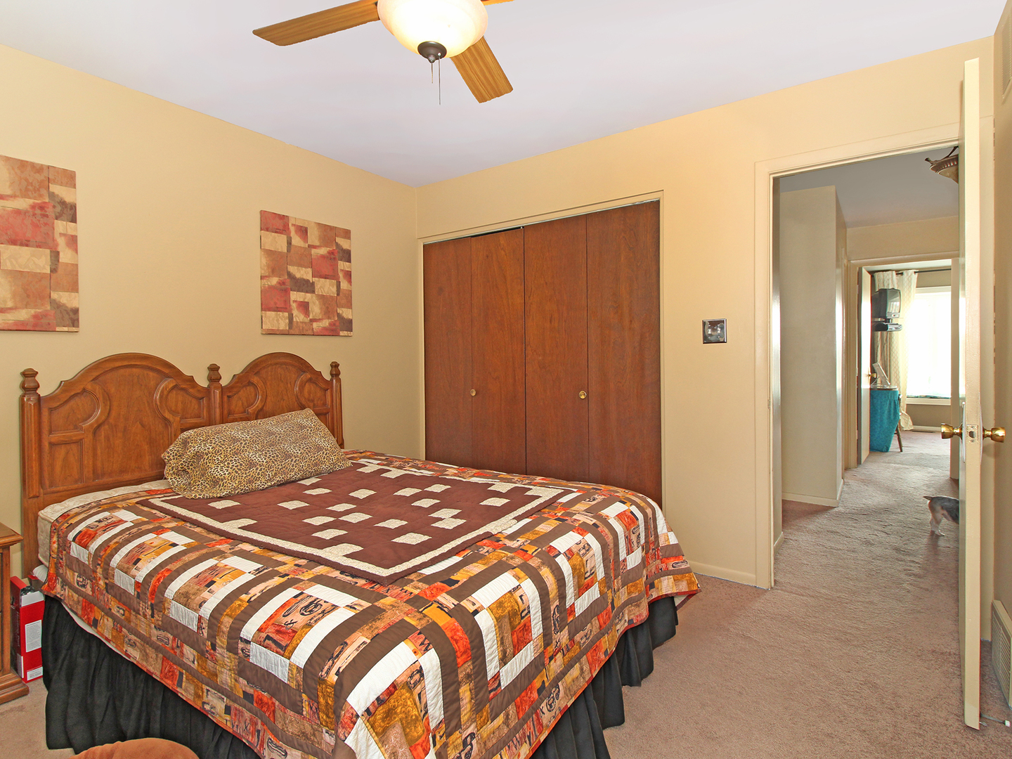 554 Rockhurst Road Bolingbrook, IL 60440 - Photo 21 of 29 a bedroom with a bed and painting on the wall