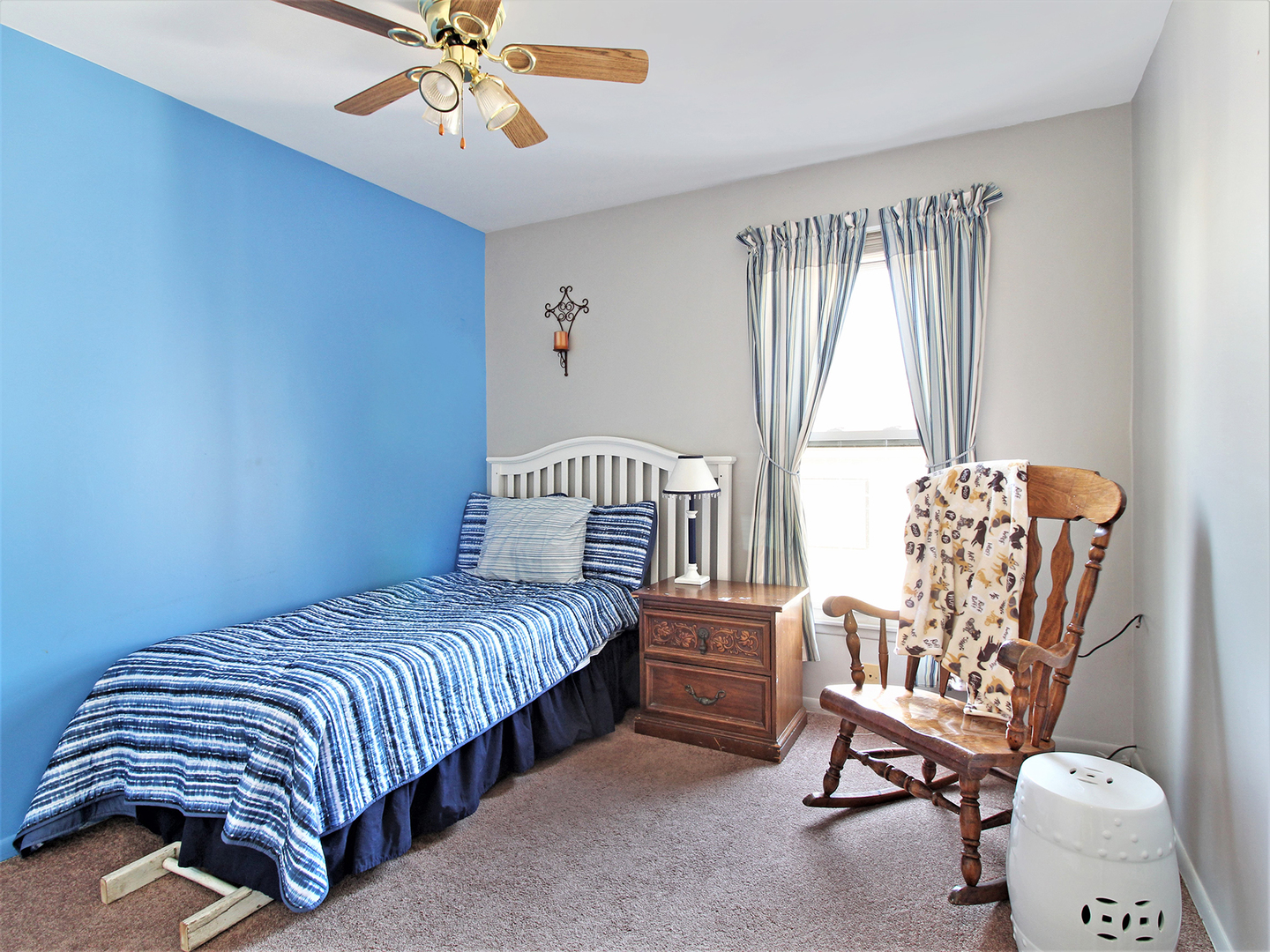 554 Rockhurst Road Bolingbrook, IL 60440 - Photo 23 of 29 a bedroom with a bed and a chandelier