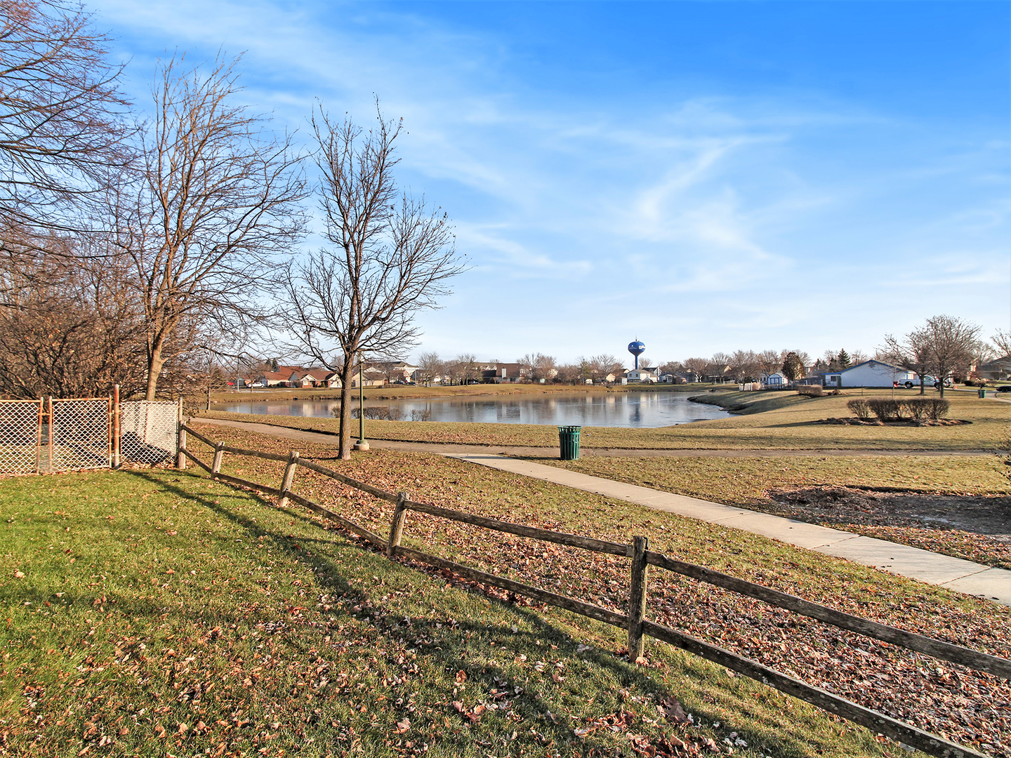 554 Rockhurst Road Bolingbrook, IL 60440 - Photo 26 of 29 a view of a yard with wooden fence