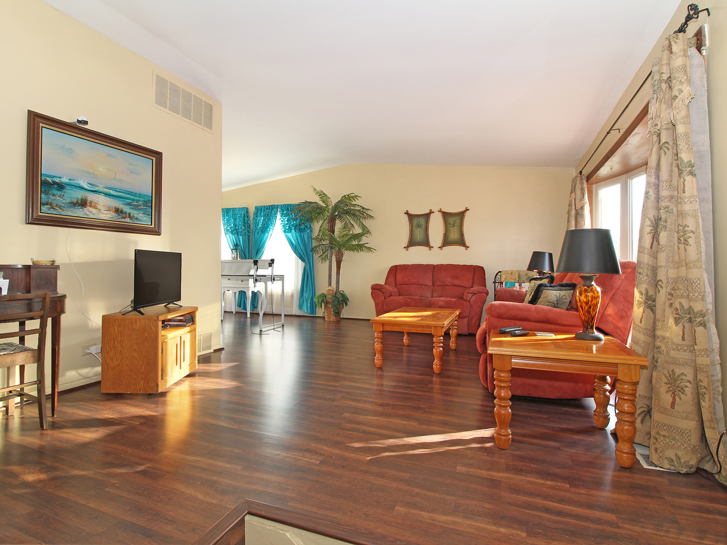 554 Rockhurst Road Bolingbrook, IL 60440 - Photo 6 of 29 a living room with furniture and a wooden floor