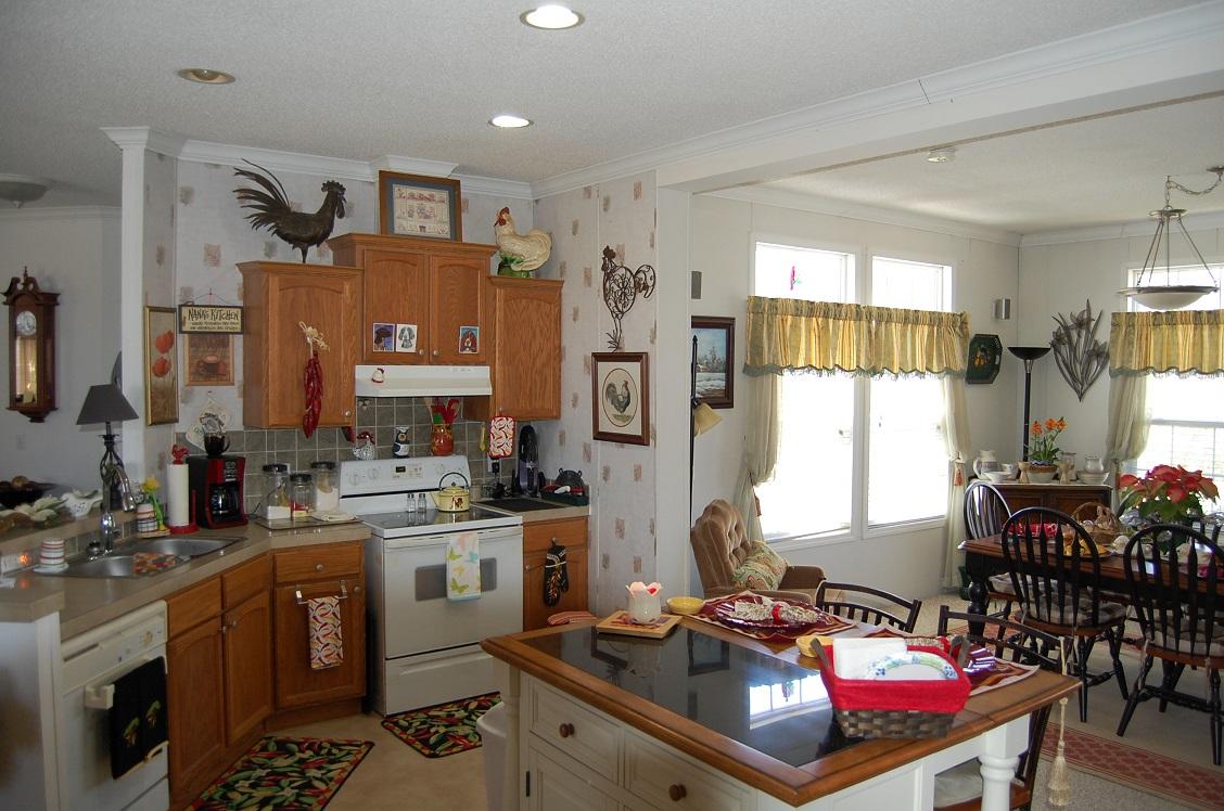 278 Dusty Rock Road Northwest Riner, VA 24149 - Photo 5 of 21 a kitchen with a stove a sink and a refrigerator