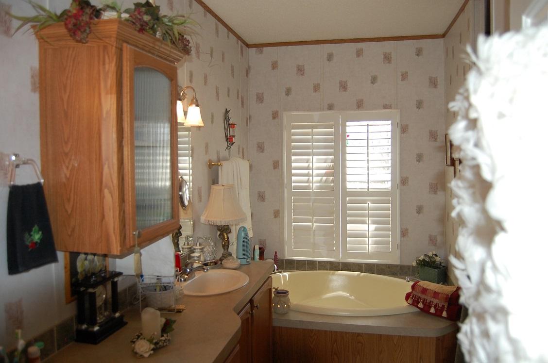 278 Dusty Rock Road Northwest Riner, VA 24149 - Photo 10 of 21 a bathroom with a sink and a bathtub