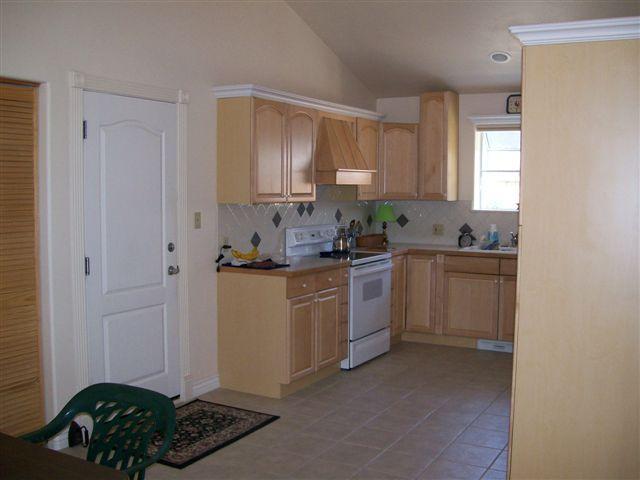 540 Birch Court Rifle, CO 81650 - Photo 3 of 5 a kitchen with a sink cabinets and window